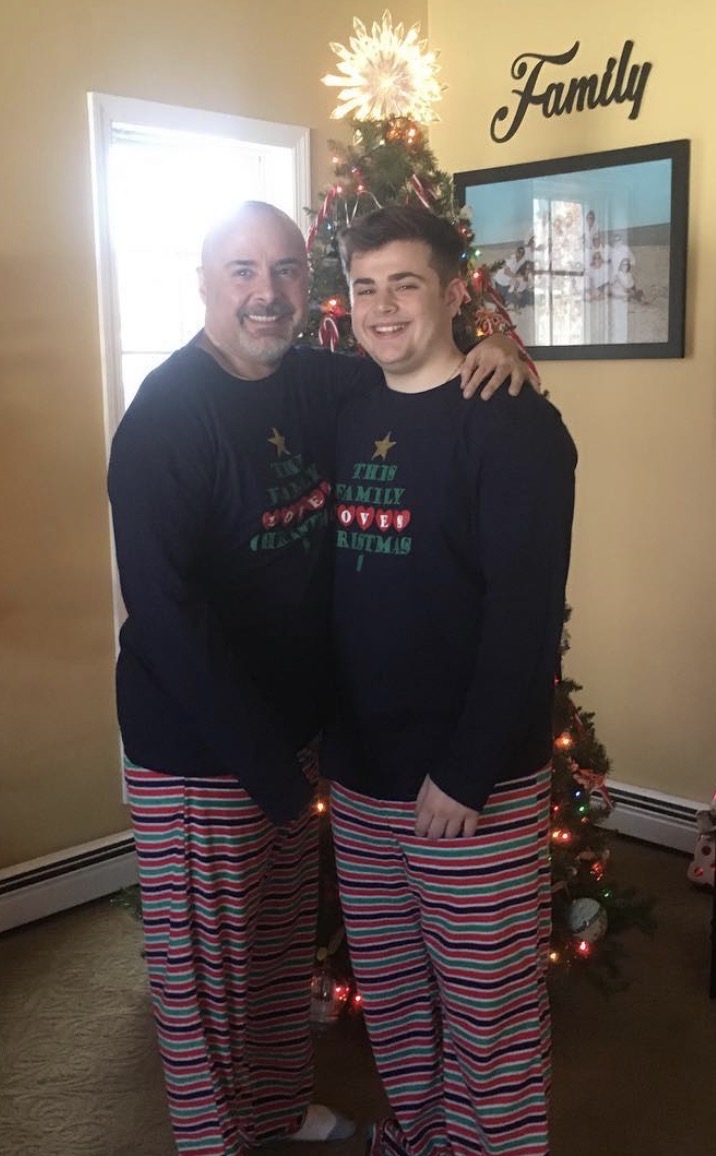 Kevin Liguori with his father Michael beside their family Christmas tree in 2018