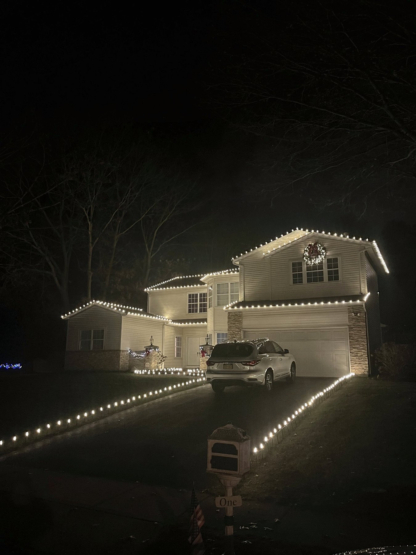 Christmas Illuminations LI holiday lighting installation: Elegant Icicle Rooflines